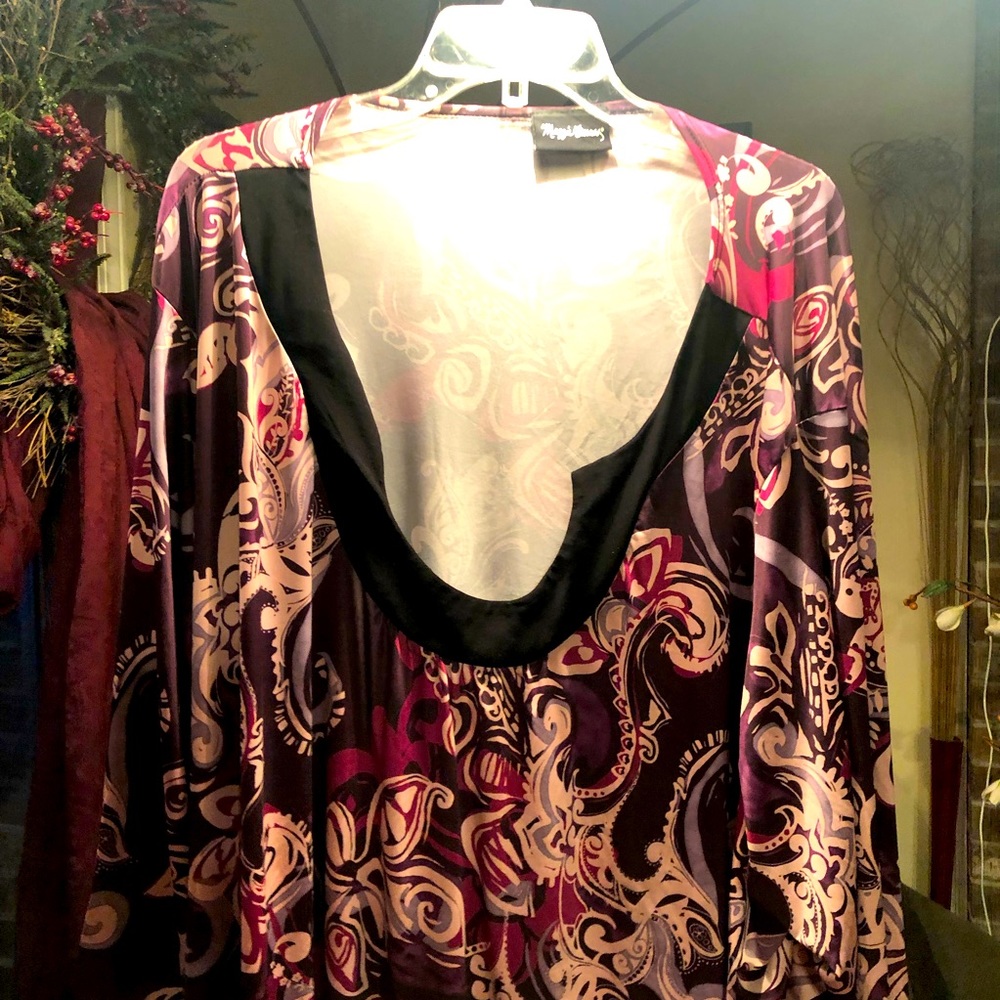 Catherine’s 5x stretchy tunic in brown’s, cream and dark red.
